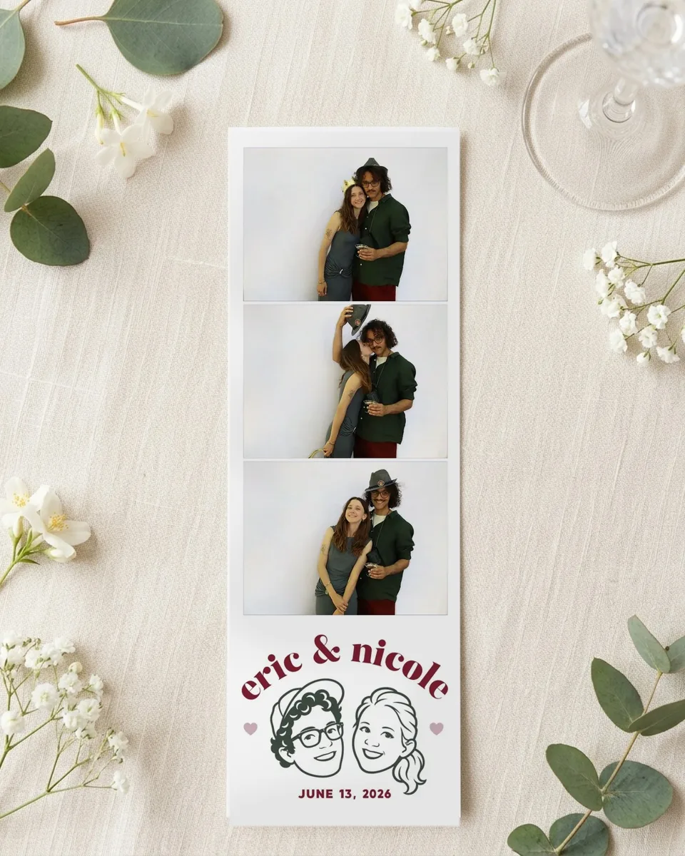 A printed 2x6 wedding strip on a table with flowers